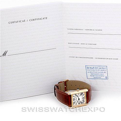 A Tank Louis model by Cartier is shown at a slight angle, along with its certificate of authenticity.