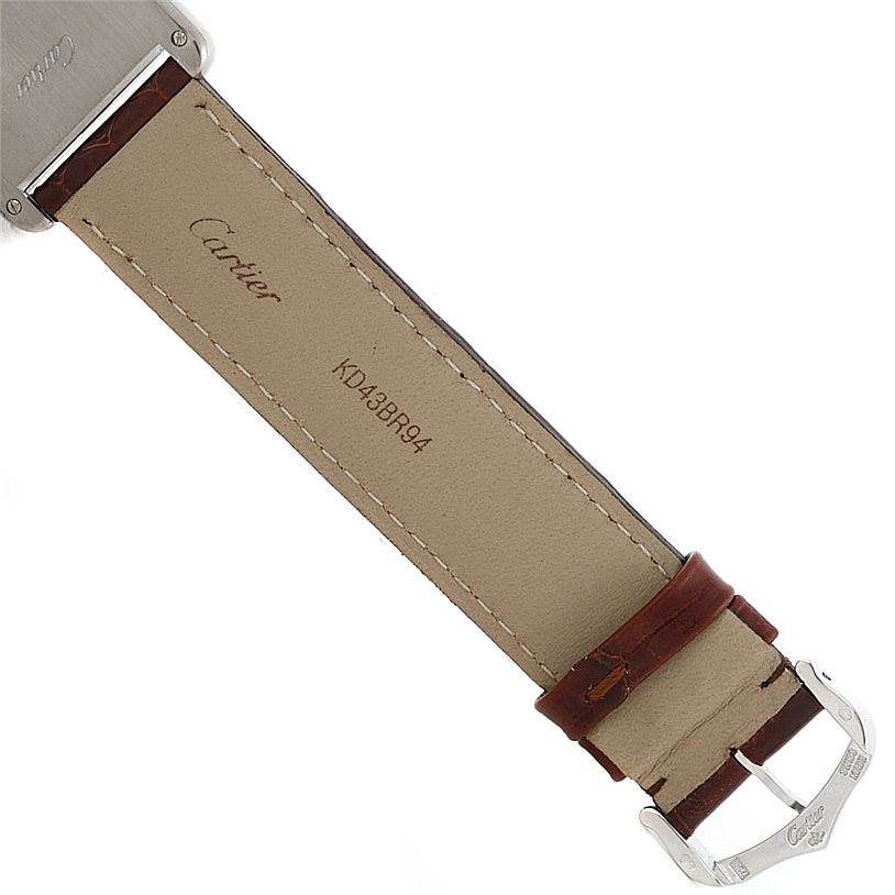 This image shows the underside of the leather strap and clasp of a Cartier Tank Louis W1540956 Men's White Gold White Dial W1540956 Men's White Gold White Dial watch.