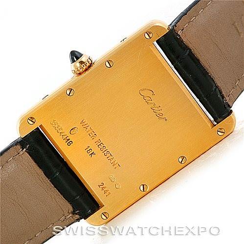 This image shows the back case and leather strap of the Cartier Tank Louis W1529756 Men's Yellow Gold Silver Dial W1529756 Men's Yellow Gold Silver Dial watch, highlighting its gold finish and engraved details.