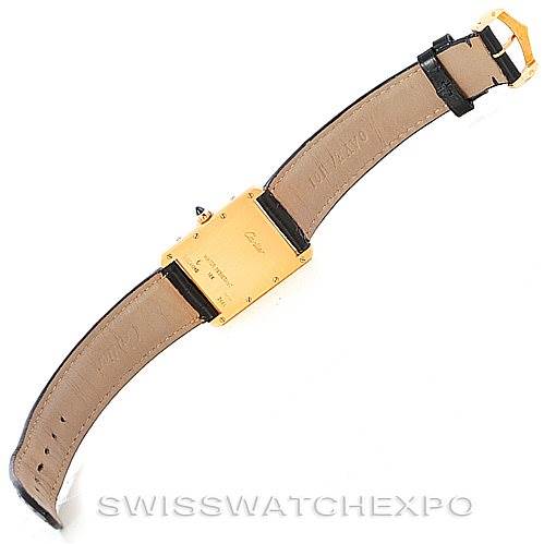 The image shows the back view of a Cartier Tank Louis W1529756 Men's Yellow Gold Silver Dial W1529756 Men's Yellow Gold Silver Dial watch with a gold case and leather strap.