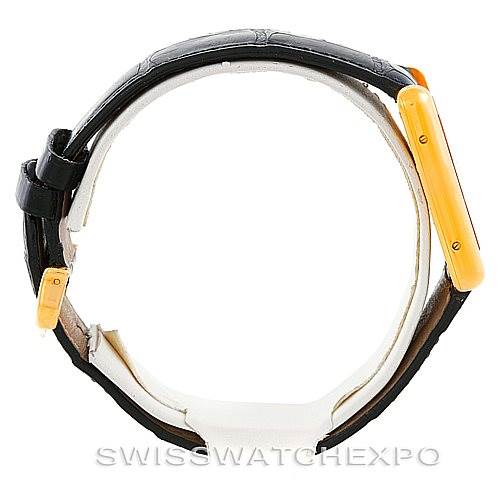 The image shows a side view of the Cartier Tank Louis W1529756 Men's Yellow Gold Silver Dial W1529756 Men's Yellow Gold Silver Dial watch, highlighting its strap and case.