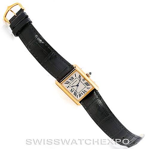 The Cartier Tank Louis W1529756 Men's Yellow Gold Silver Dial W1529756 Men's Yellow Gold Silver Dial watch is shown at an angle displaying its rectangular face, black leather strap, and gold casing.