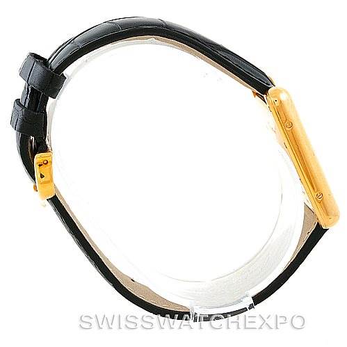 The image shows a side view of a Cartier Tank Louis W1529756 Men's Yellow Gold Silver Dial W1529756 Men's Yellow Gold Silver Dial watch, highlighting its black leather strap and gold case.