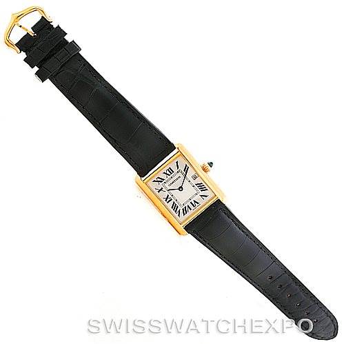 The image shows a Cartier Tank Louis W1529756 Men's Yellow Gold Silver Dial W1529756 Men's Yellow Gold Silver Dial watch from a top-down view, displaying the black leather strap and rectangular gold case with Roman numerals.