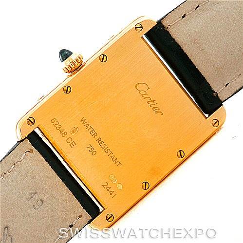 The image shows the back of a Cartier Tank Louis W1529756 Men's Yellow Gold Silver Dial W1529756 Men's Yellow Gold Silver Dial watch, displaying the case back and part of the leather strap.