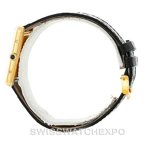 The image shows a side view of a Cartier Tank Louis W1529756 Men's Yellow Gold Silver Dial W1529756 Men's Yellow Gold Silver Dial watch, highlighting its gold case, black leather strap, and blue cabochon crown.