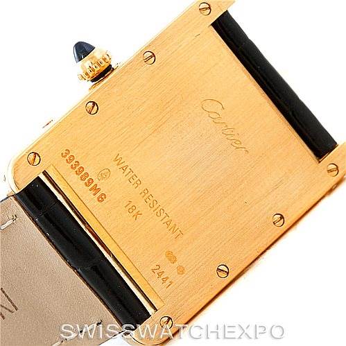 The image shows the back case of the Cartier Tank Louis W1529756 Men's Yellow Gold Silver Dial W1529756 Men's Yellow Gold Silver Dial watch, highlighting its water resistance and 18k gold features.
