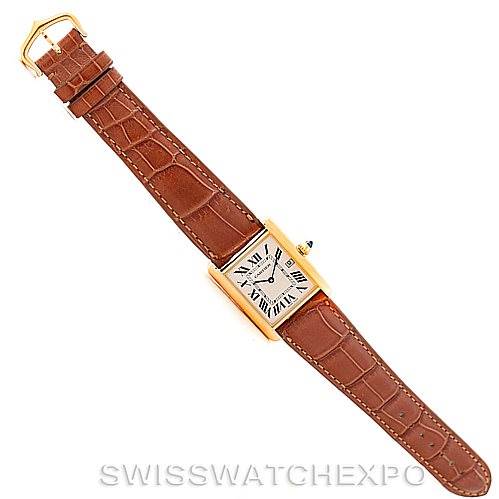 The image shows a Cartier Tank Louis W1529756 Men's Yellow Gold Silver Dial W1529756 Men's Yellow Gold Silver Dial model watch at a top-down angle, highlighting the brown leather strap and rectangular gold case.