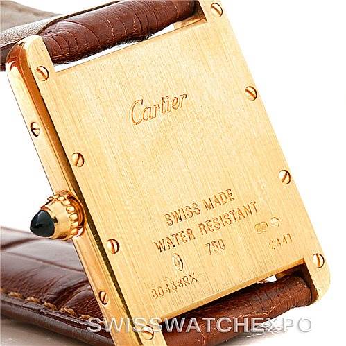 This image shows the back case and leather strap of a Cartier Tank Louis W1529756 Men's Yellow Gold Silver Dial W1529756 Men's Yellow Gold Silver Dial watch.