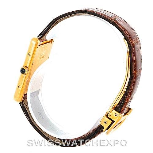 The image shows a Cartier Tank Louis W1529756 Men's Yellow Gold Silver Dial W1529756 Men's Yellow Gold Silver Dial watch from a side angle, highlighting its leather strap and gold case.