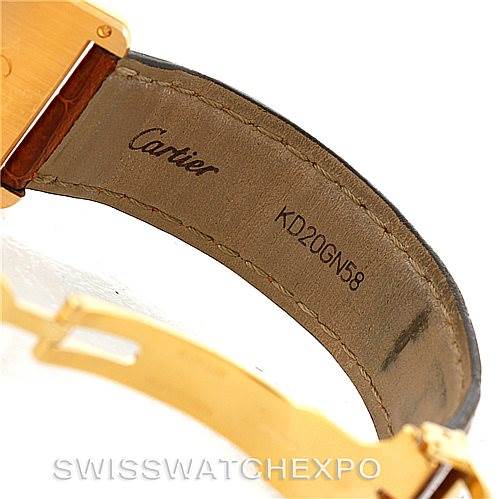 The image shows the inner side of the leather strap and clasp mechanism of a Cartier Tank Louis W1529756 Men's Yellow Gold Silver Dial W1529756 Men's Yellow Gold Silver Dial watch.