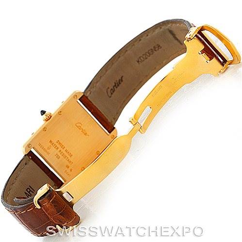 The image shows the underside of a Cartier Tank Louis W1529756 Men's Yellow Gold Silver Dial W1529756 Men's Yellow Gold Silver Dial watch, highlighting the clasp, case back, and leather strap.