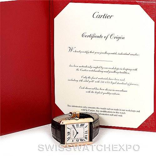 The image shows the Cartier Tank Louis W1551451 Men's Rose Gold Silver Dial W1551451 Men's Rose Gold Silver Dial watch with a Certificate of Origin, displayed on a white surface with a red folder.