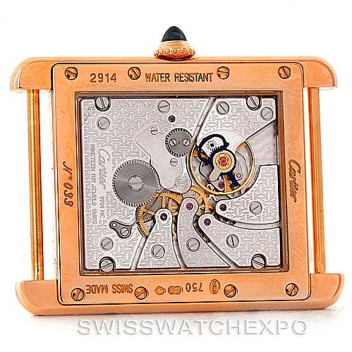 This image shows the back view of the Tank Louis model by Cartier, revealing its mechanical movement through a transparent case back.