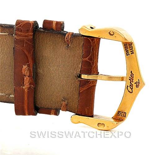 This image shows a side view of the buckle and part of the leather strap of a Tank Louis watch by Cartier.