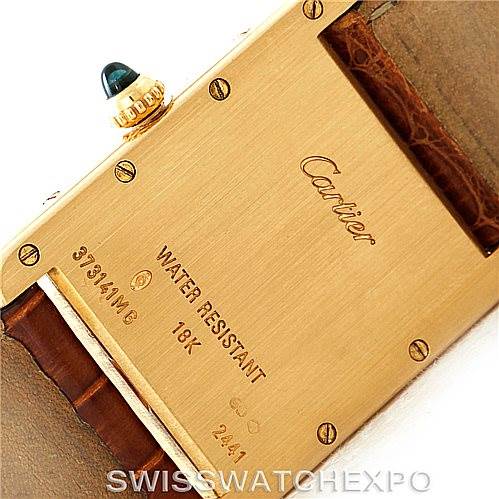 The image shows the backside of a Cartier Tank Louis W1529756 Men's Yellow Gold Silver Dial W1529756 Men's Yellow Gold Silver Dial watch, highlighting its case back and water resistance markings.