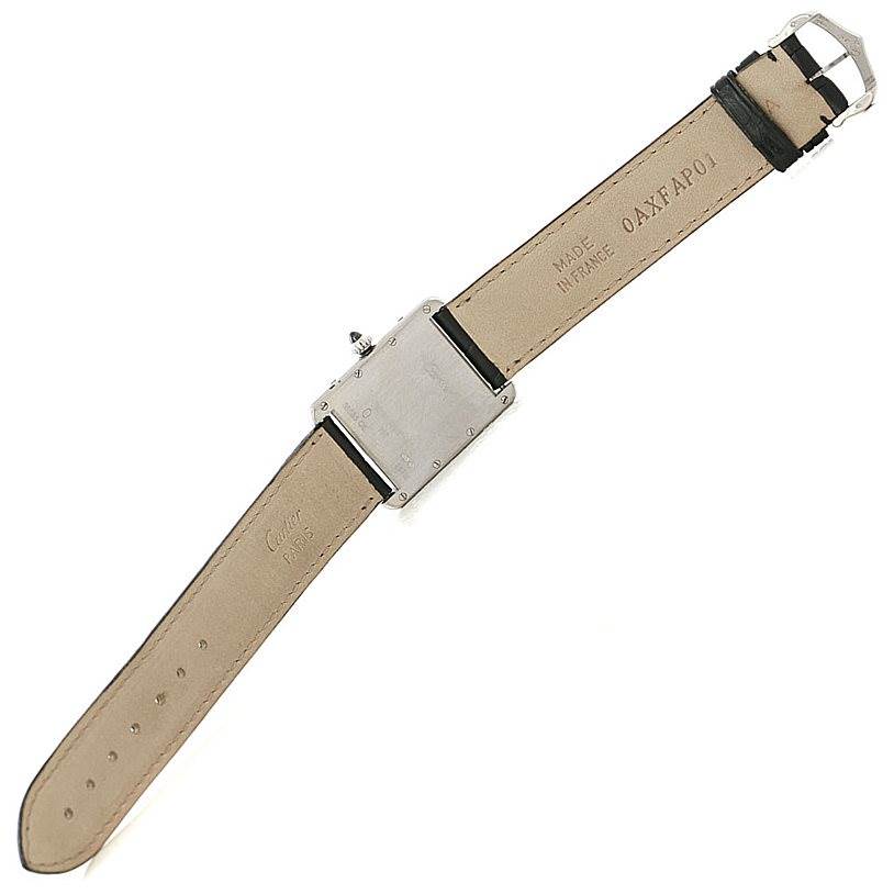This is the backside view of a Tank Louis Cartier watch, showing the case back and leather straps.