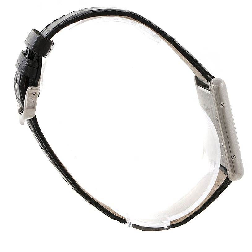 This side view shows the profile of the Cartier Tank Louis W1540956 Men's White Gold White Dial W1540956 Men's White Gold White Dial watch, highlighting its rectangular case and black leather strap.
