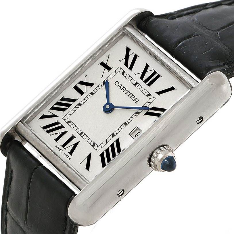 The image shows a Cartier Tank Louis W1540956 Men's White Gold White Dial W1540956 Men's White Gold White Dial watch at an angled view, highlighting its rectangular face, Roman numerals, and leather strap.