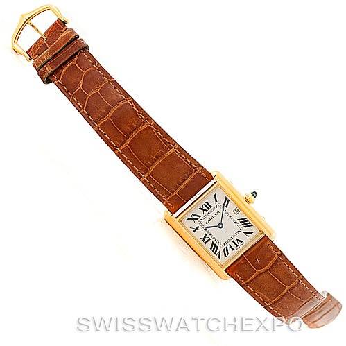 The image shows a top view of the Cartier Tank Louis W1529756 Men's Yellow Gold Silver Dial W1529756 Men's Yellow Gold Silver Dial watch, highlighting its rectangular dial, Roman numerals, and brown leather strap.