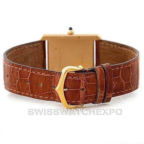 The image shows the back view of a Cartier Tank Louis W1529756 Men's Yellow Gold Silver Dial W1529756 Men's Yellow Gold Silver Dial watch, highlighting its brown leather strap and gold buckle.