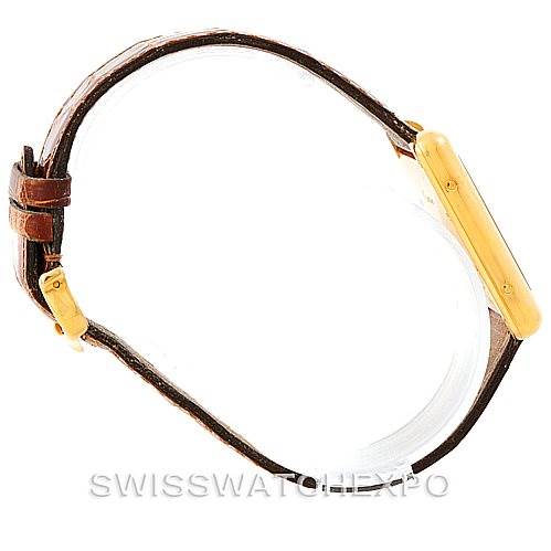 This image shows a side view of the Cartier Tank Louis W1529756 Men's Yellow Gold Silver Dial W1529756 Men's Yellow Gold Silver Dial model, highlighting its band and slim case.