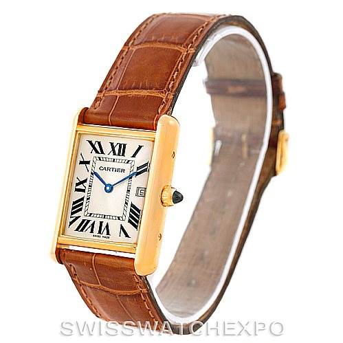 This image shows a Tank Louis Cartier watch with a gold case, Roman numeral dial, and brown leather strap, angled slightly to the side.