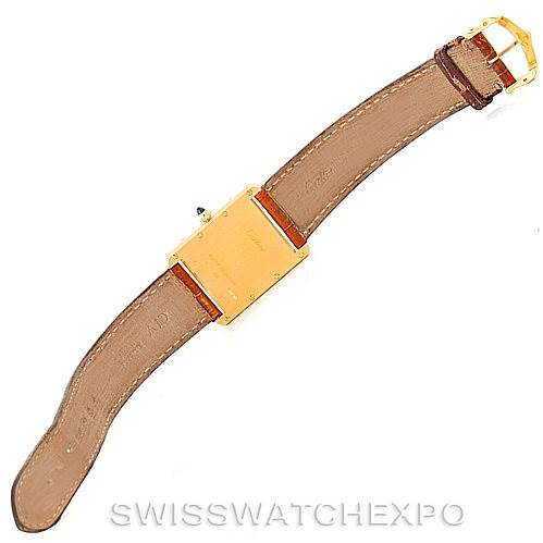 This image shows the back view of the Cartier Tank Louis W1529756 Men's Yellow Gold Silver Dial W1529756 Men's Yellow Gold Silver Dial watch, highlighting the leather strap and gold clasp.