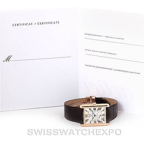 The image shows a Cartier Tank Louis W1560003 Men
s Rose Gold Silver Dial W1560003 Men
s Rose Gold Silver Dial watch with a brown strap, positioned in front of an open certificate booklet.