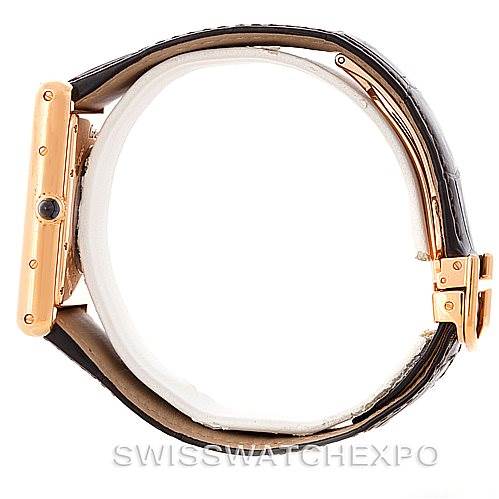 This image shows a side view of the Cartier Tank Louis W1560003 Men
s Rose Gold Silver Dial W1560003 Men
s Rose Gold Silver Dial watch, highlighting its case, crown, and strap with a buckle.