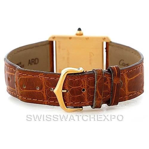 The image shows the back angle of a Cartier Tank Louis W1529756 Men's Yellow Gold Silver Dial W1529756 Men's Yellow Gold Silver Dial model watch, highlighting the brown leather strap and gold buckle.
