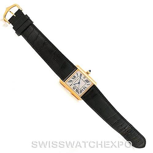 The image shows a top-down view of the Cartier Tank Louis W1529756 Men's Yellow Gold Silver Dial W1529756 Men's Yellow Gold Silver Dial watch with a black leather strap and a rectangular gold case.
