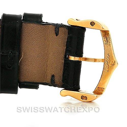 This image shows a close-up view of the gold buckle and part of the black leather strap of the Cartier Tank Louis W1529756 Men's Yellow Gold Silver Dial W1529756 Men's Yellow Gold Silver Dial watch.