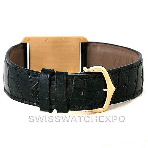 The image shows the strap and backside of a Cartier Tank Louis W1529756 Men's Yellow Gold Silver Dial W1529756 Men's Yellow Gold Silver Dial watch, focusing on the black leather band and gold clasp.