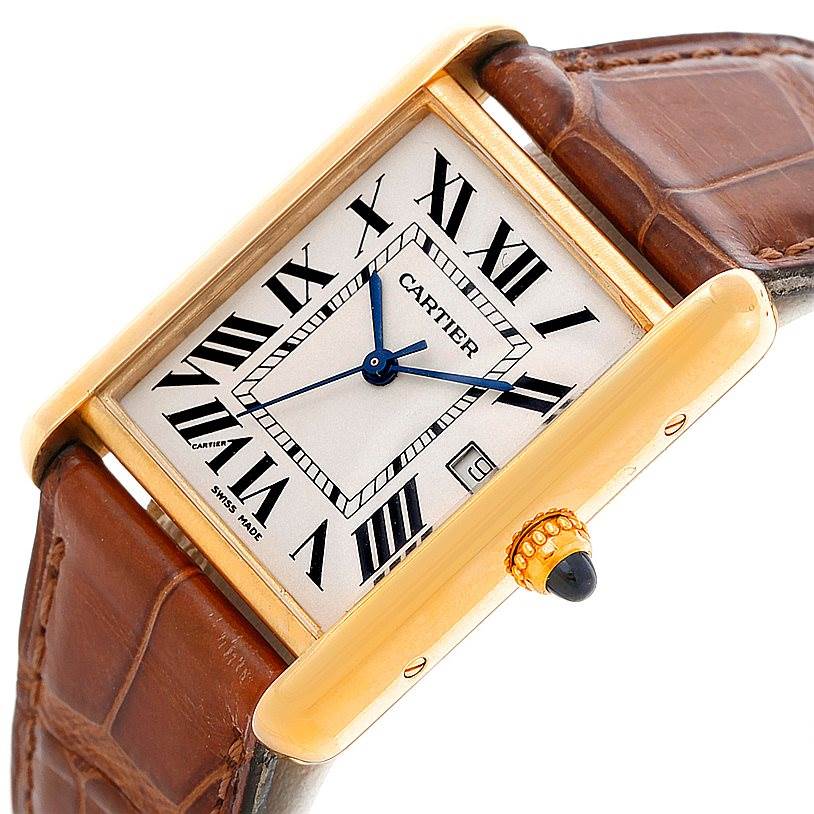 This image shows a Cartier Tank Louis W1529756 Men's Yellow Gold Silver Dial W1529756 Men's Yellow Gold Silver Dial watch from a slight top-side angle, highlighting the face, crown, and leather strap.