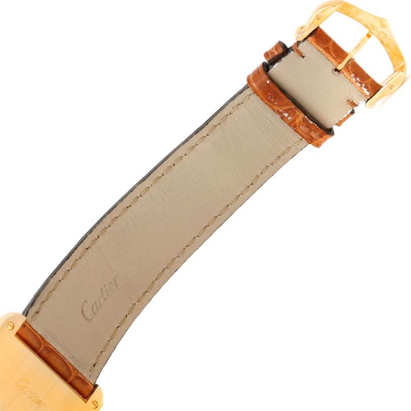 The image shows the back side of the leather strap and buckle of a Cartier Tank Louis W1529756 Men's Yellow Gold Silver Dial W1529756 Men's Yellow Gold Silver Dial watch.