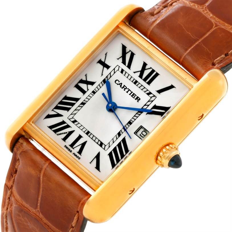 The image shows a close-up of the Cartier Tank Louis W1529756 Men's Yellow Gold Silver Dial W1529756 Men's Yellow Gold Silver Dial watch face, featuring its rectangular case, Roman numerals, and brown leather strap.