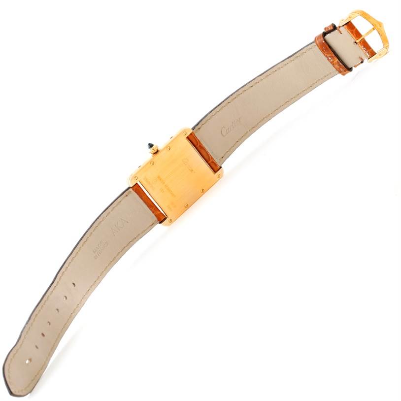 This image shows the back and strap of the Cartier Tank Louis W1529756 Men's Yellow Gold Silver Dial W1529756 Men's Yellow Gold Silver Dial watch, highlighting the case back, buckle, and leather bands.