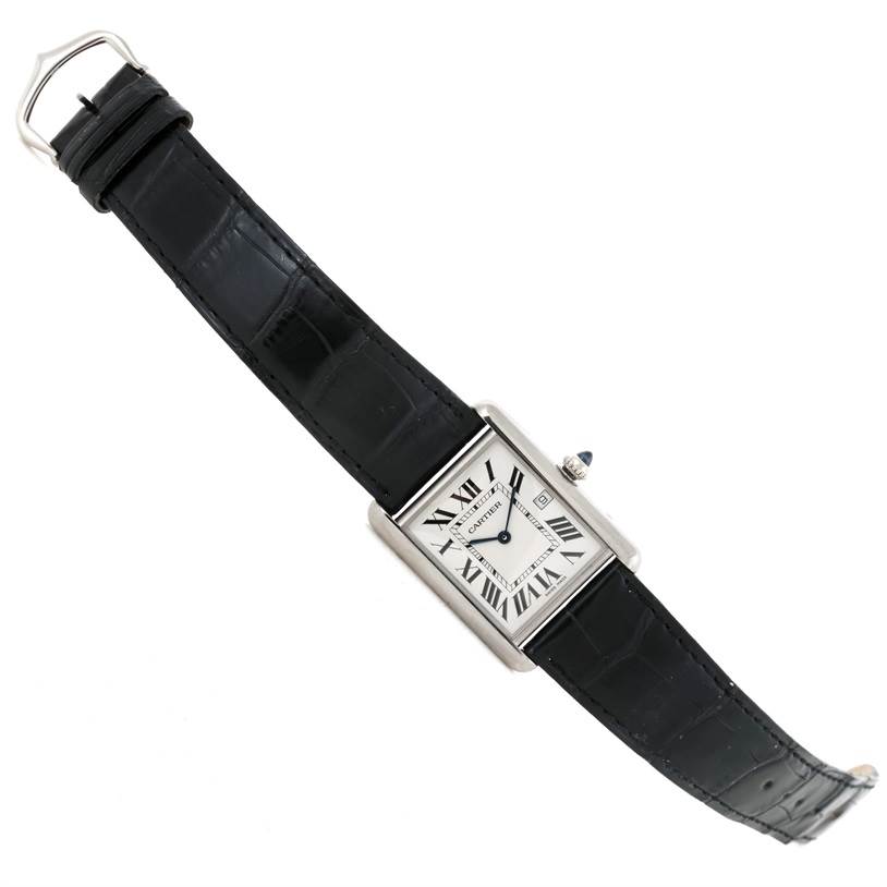 The image shows a Cartier Tank Louis W1540956 Men's White Gold White Dial W1540956 Men's White Gold White Dial watch at an angled top view, highlighting its black leather strap and rectangular dial with Roman numerals.