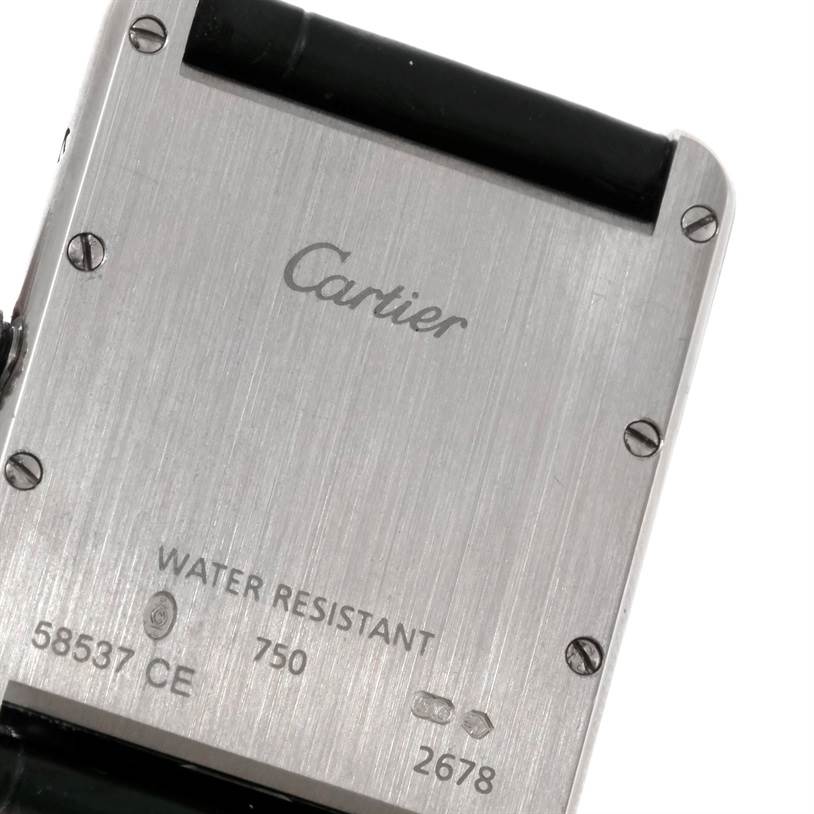 This image shows the back case of a Cartier Tank Louis W1540956 Men's White Gold White Dial W1540956 Men's White Gold White Dial watch, highlighting the brand name and model details.