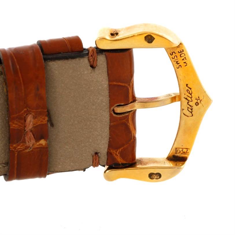 This image shows a close-up of the buckle and leather strap of a Cartier Tank Louis W1529756 Men's Yellow Gold Silver Dial W1529756 Men's Yellow Gold Silver Dial watch.