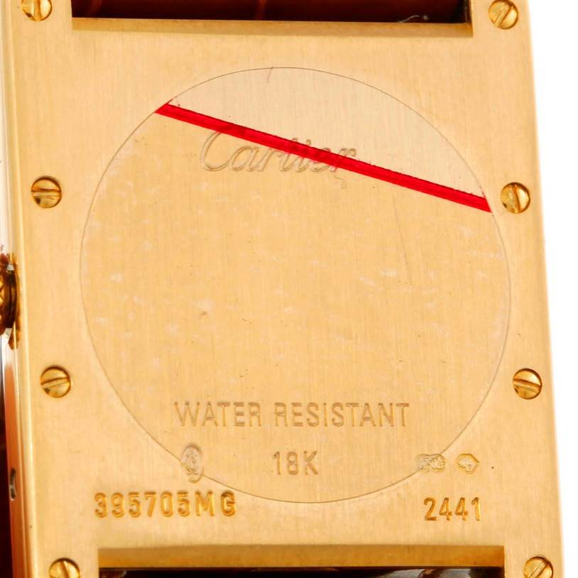 This image shows the back of a Cartier Tank Louis W1529756 Men's Yellow Gold Silver Dial W1529756 Men's Yellow Gold Silver Dial watch, highlighting engravings, including "WATER RESISTANT" and "18K."