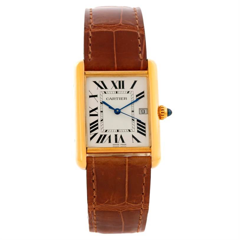 The image shows a front view of the Tank Louis model by Cartier, displaying its rectangular face, Roman numerals, blue hands, and leather strap.