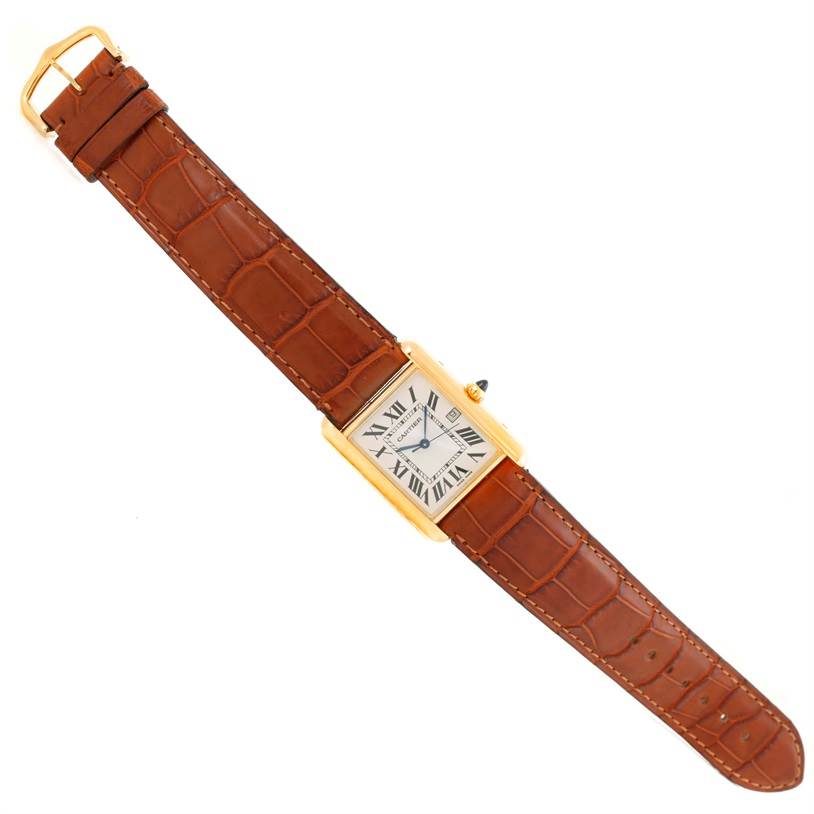 The Cartier Tank Louis W1529756 Men
s Silver Dial W1529756 Men
s Silver Dial watch is shown flat from a top-down angle, displaying the face, strap, and buckle.