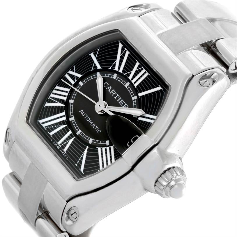 The image shows a close-up angle of a Cartier Roadster W62041V3 Men
s Stainless Steel Black Dial W62041V3 Men
s Stainless Steel Black Dial watch, highlighting the face, bezel, crown, and part of the bracelet.