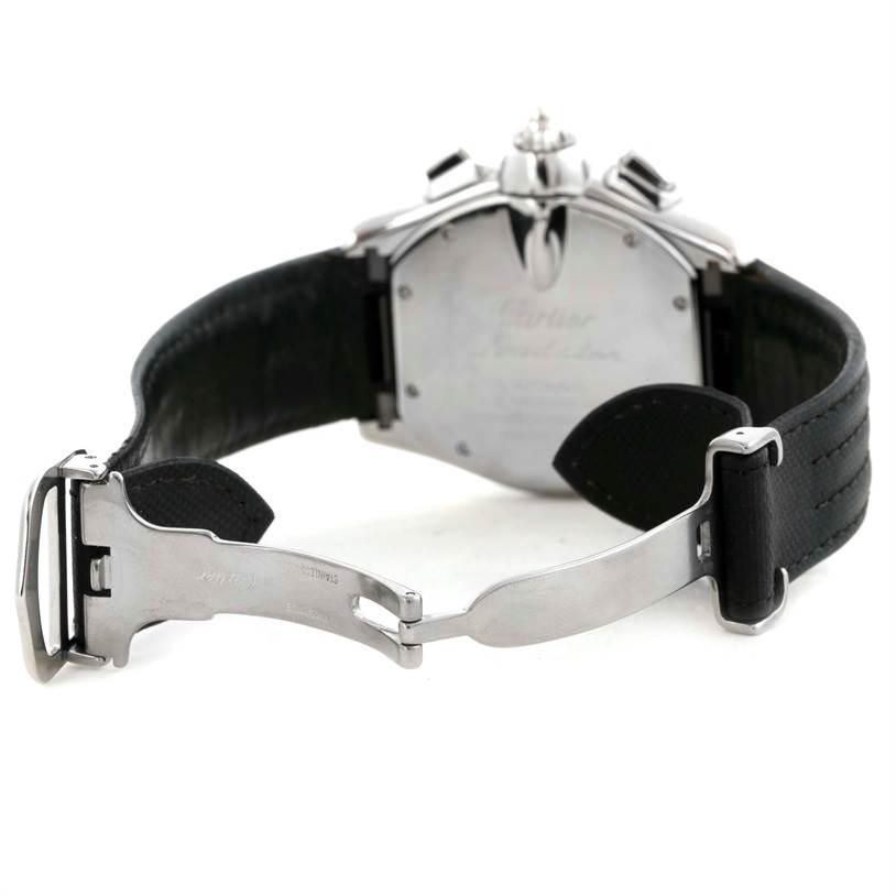 The image shows the back view of a Cartier Roadster W62020X6 Men
s Stainless Steel Black Dial W62020X6 Men
s Stainless Steel Black Dial watch, focusing on its open clasp and strap.