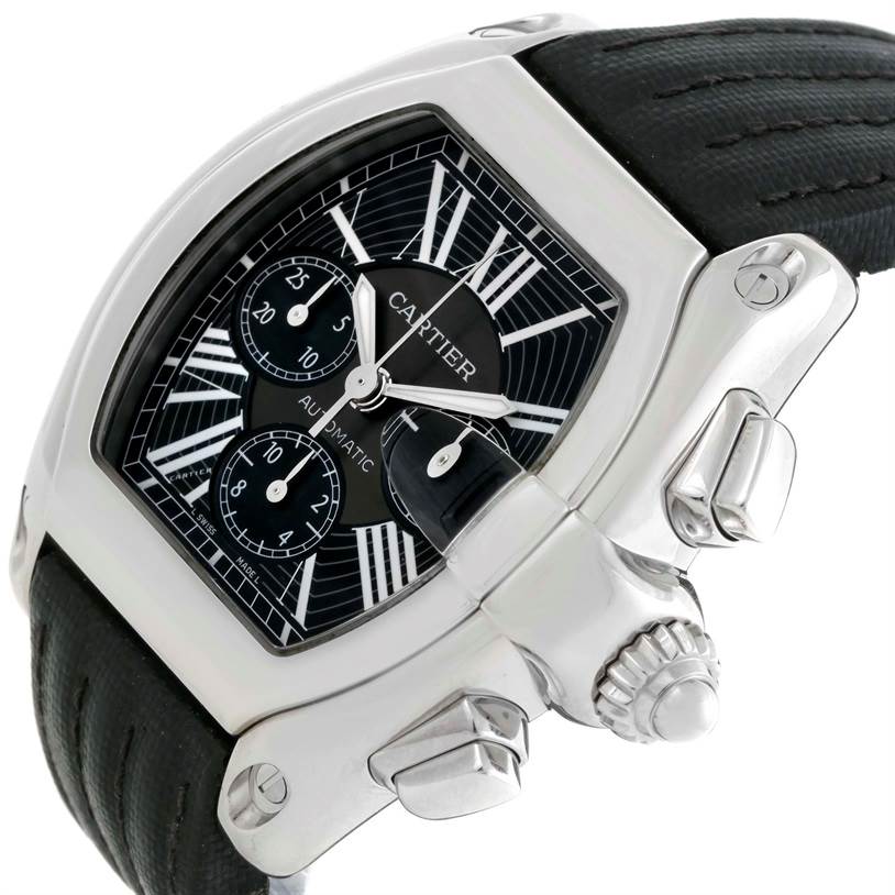 The Cartier Roadster W62020X6 Men
s Stainless Steel Black Dial W62020X6 Men
s Stainless Steel Black Dial watch is shown at an angle that highlights the dial, strap, and crown with chronograph pushers.