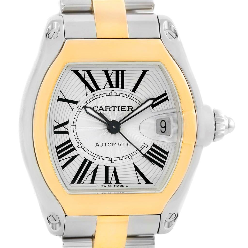 The image shows a front view of the Cartier Roadster W62031Y4 Men's Steel and Gold (two tone) Silver Dial W62031Y4 Men's Steel and Gold (two tone) Silver Dial watch, highlighting the dial, bezel, and part of the bracelet.