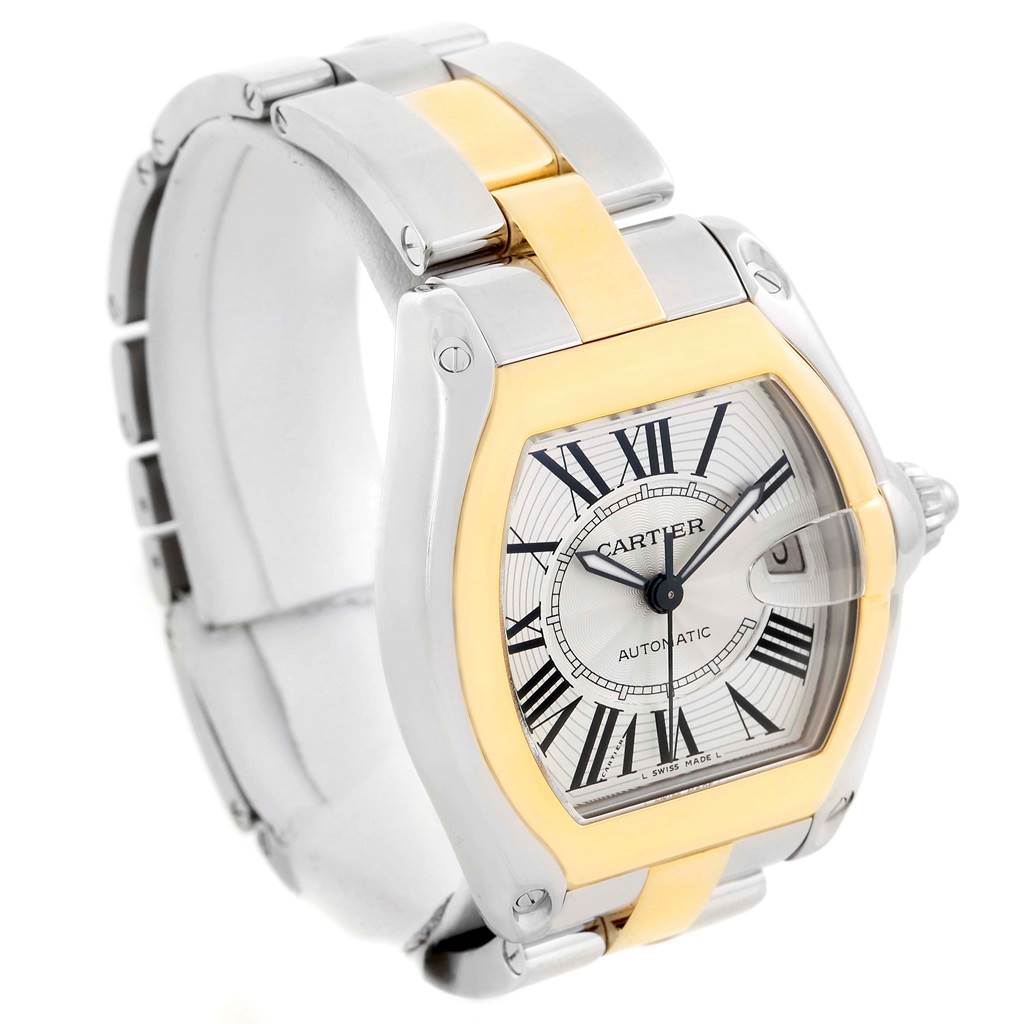 The Cartier Roadster W62031Y4 Men's Steel and Gold (two tone) Silver Dial W62031Y4 Men's Steel and Gold (two tone) Silver Dial watch is shown at a 3/4 angle, highlighting the face, bezel, and metal bracelet.