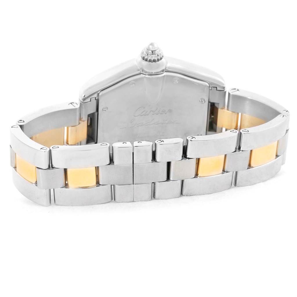 This image shows the back view of a Cartier Roadster W62031Y4 Men's Steel and Gold (two tone) Silver Dial W62031Y4 Men's Steel and Gold (two tone) Silver Dial watch, focusing on the case back and two-tone bracelet.